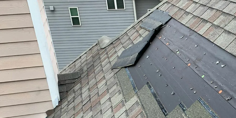 Wind damage roof repair professionals in Newnan, GA